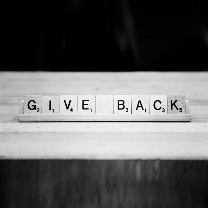 Gives back