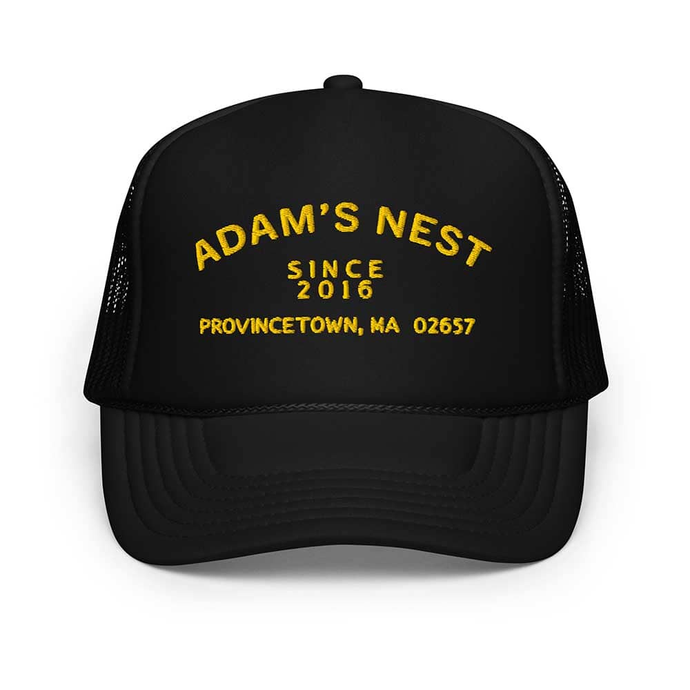 Black trucker hat with yellow text on a white background