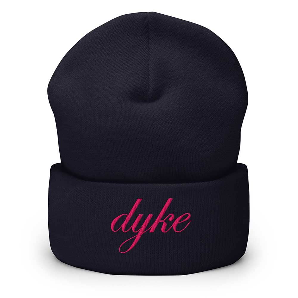 Navy beanie with pink 'dyke' text on a white background