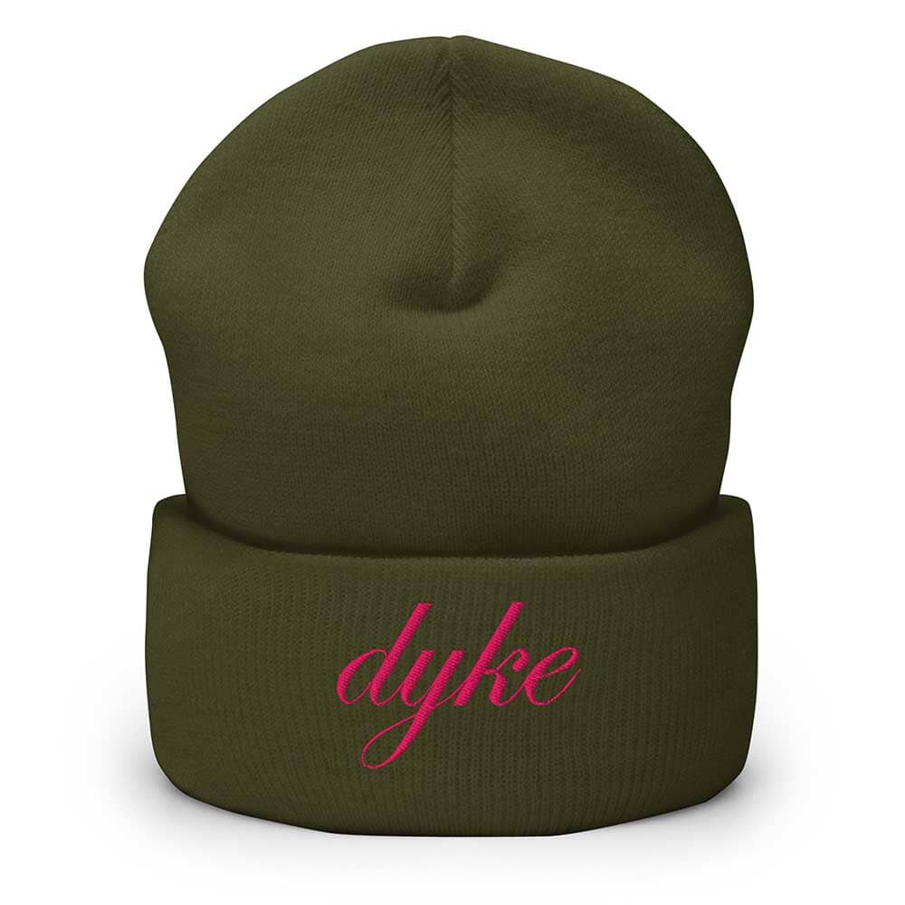 Green beanie with 'dyke' embroidered in pink on a white background
