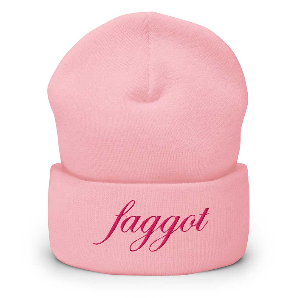 Pink beanie with the word 'faggot' embroidered on it against a white background