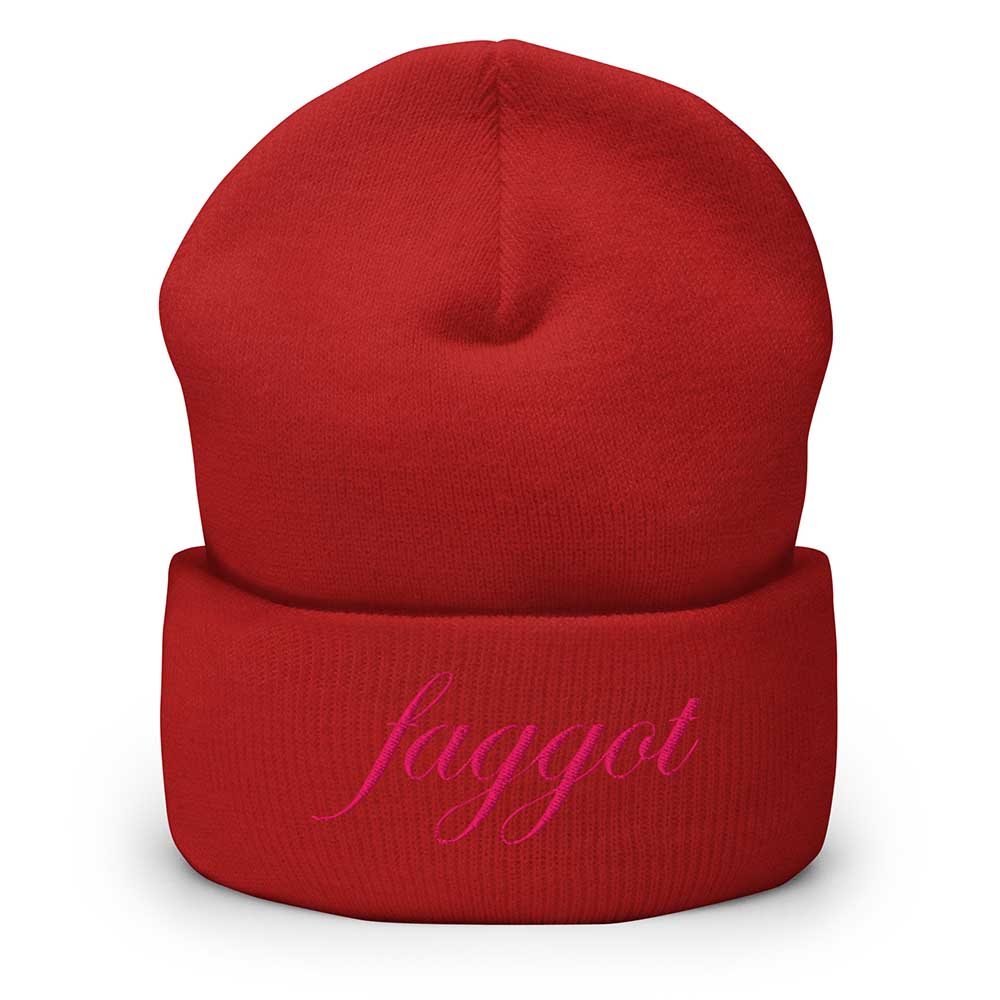 Red beanie with pink faggot text on a white background