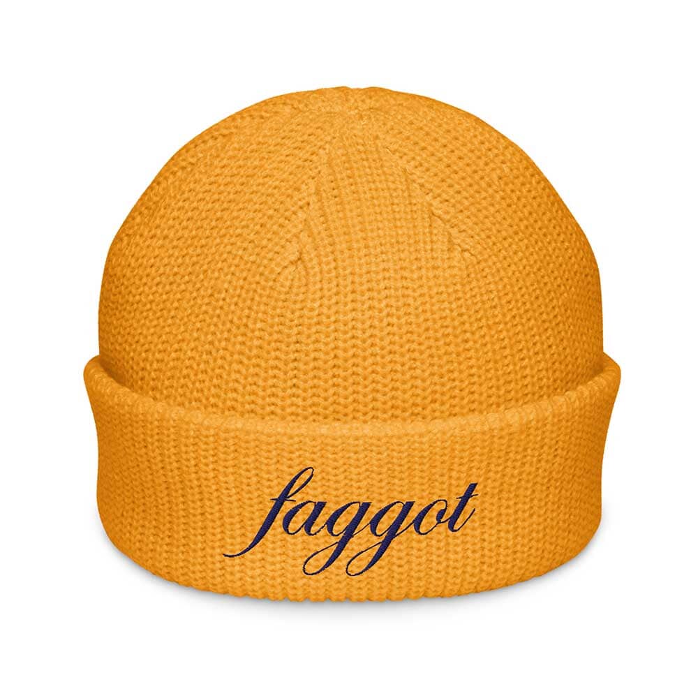 golden yellow beanie with 'faggot' in navy text on a white background
