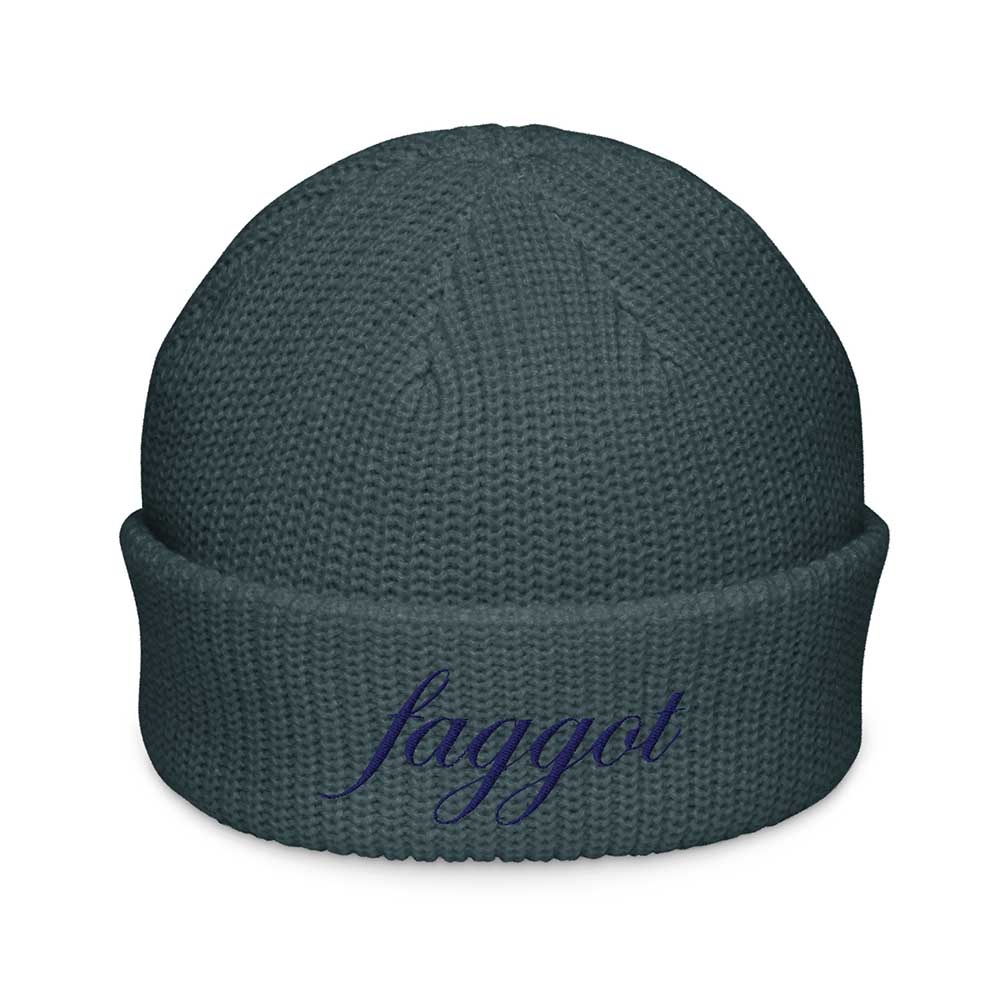 Dark green beanie with 'faggot' embroidered on a white background
