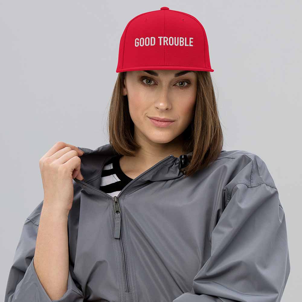 GOOD TROUBLE Flatbill 6-Panel Snapback Hat red on woman