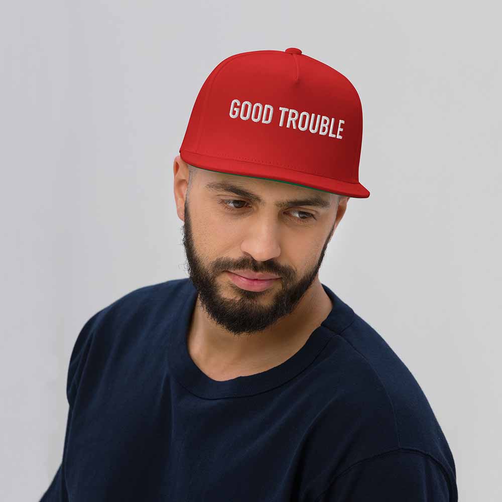 GOOD TROUBLE Flatbill 5-Panel Snapback Hat red on man