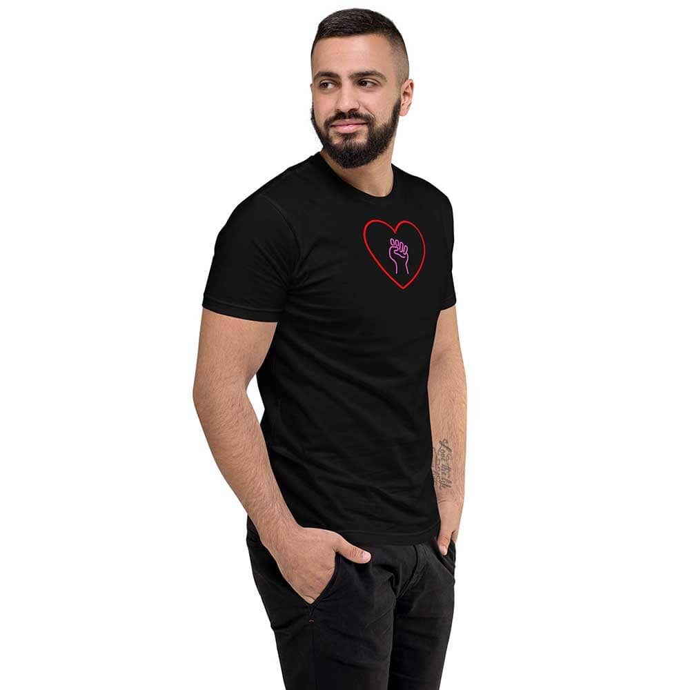 Man wearing a black t-shirt with a heart and pink solidarity fist design on a white background
