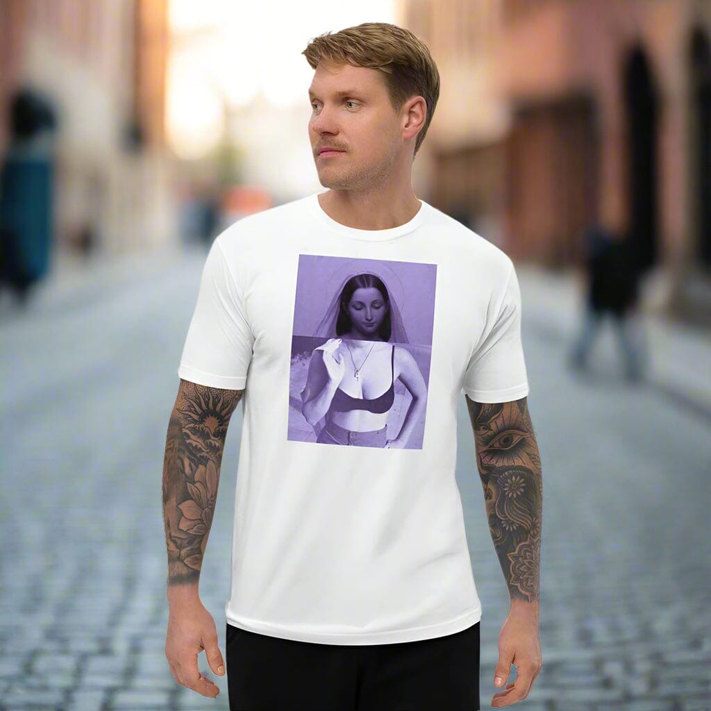 Man wearing a white t-shirt with a graphic design of Mary in a bra on a cobblestone street