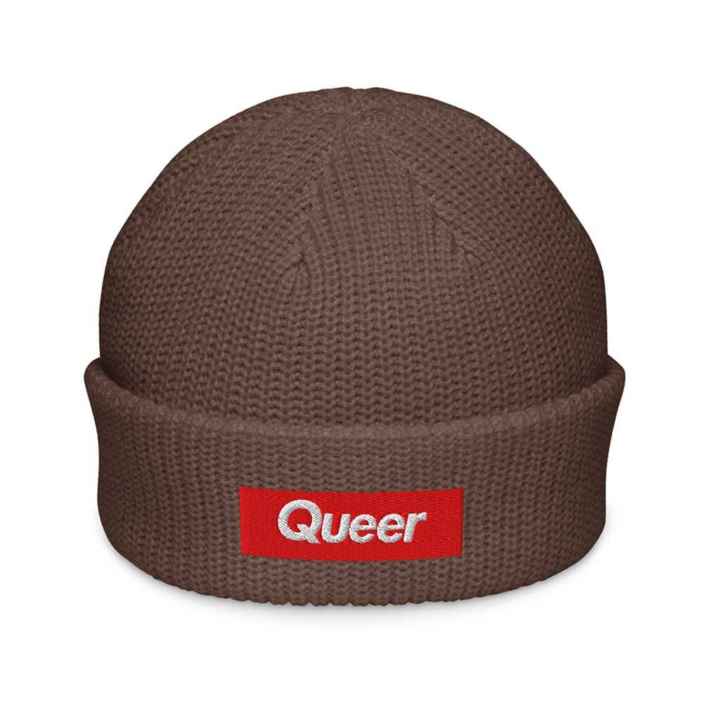 Brown beanie with a red 'Queer' patch on a white background