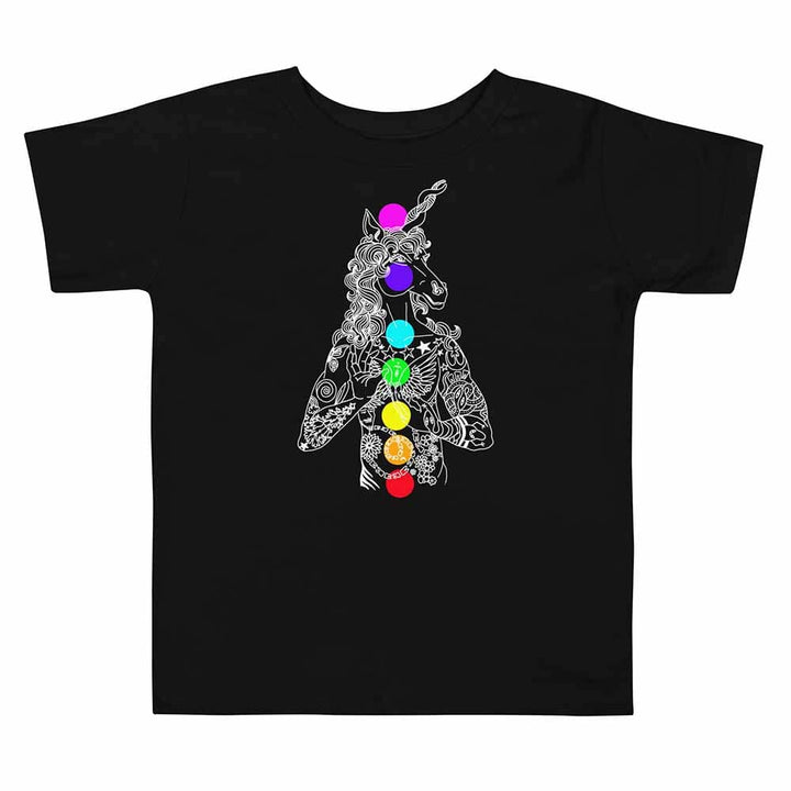 Black t-shirt with a unicorn design featuring colorful chakra symbols on a white background