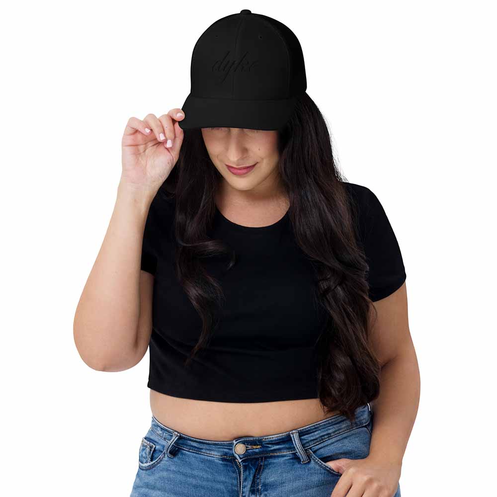 Black-on-black Dyke Mesh Trucker Snapback Hat on woman
