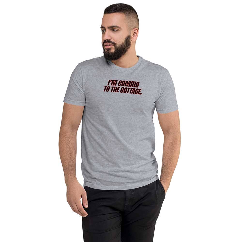 Man wearing a gray t-shirt with text on a white background