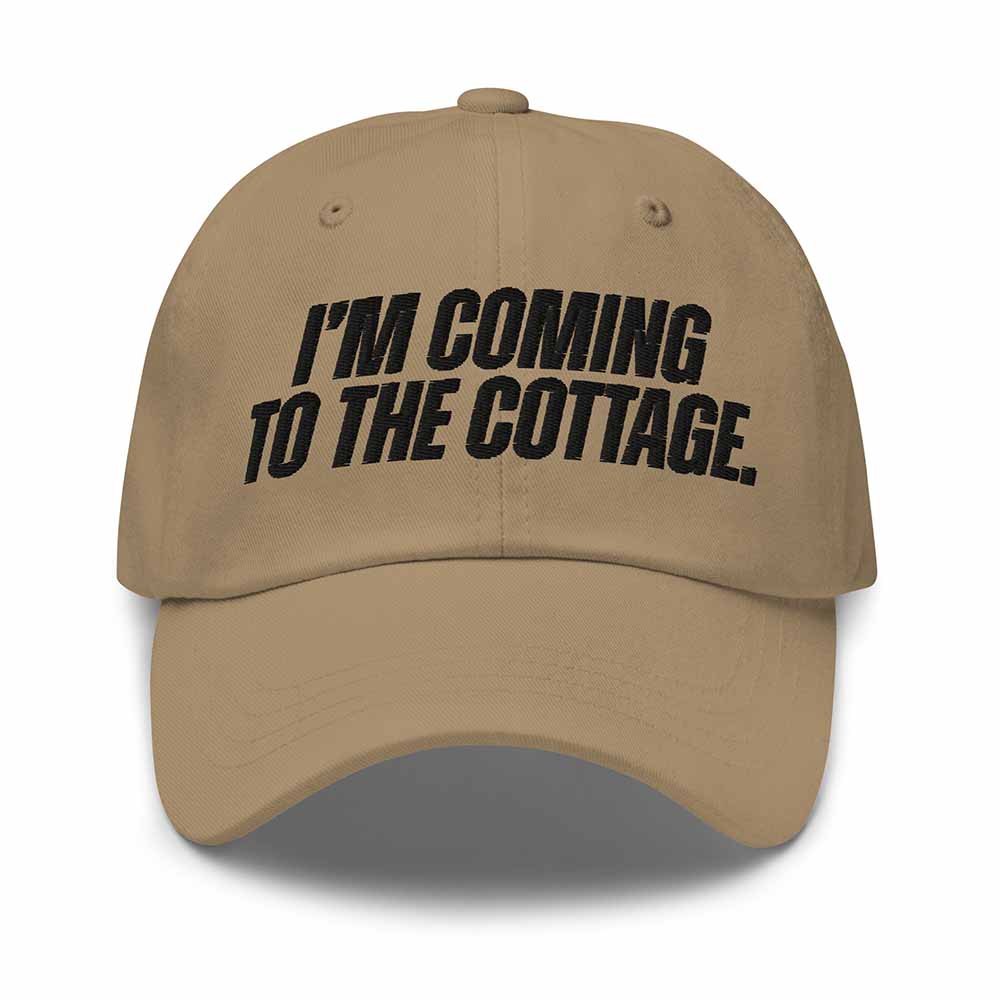 Khaki cap with 'I'm Coming to the Cottage' text on a white background