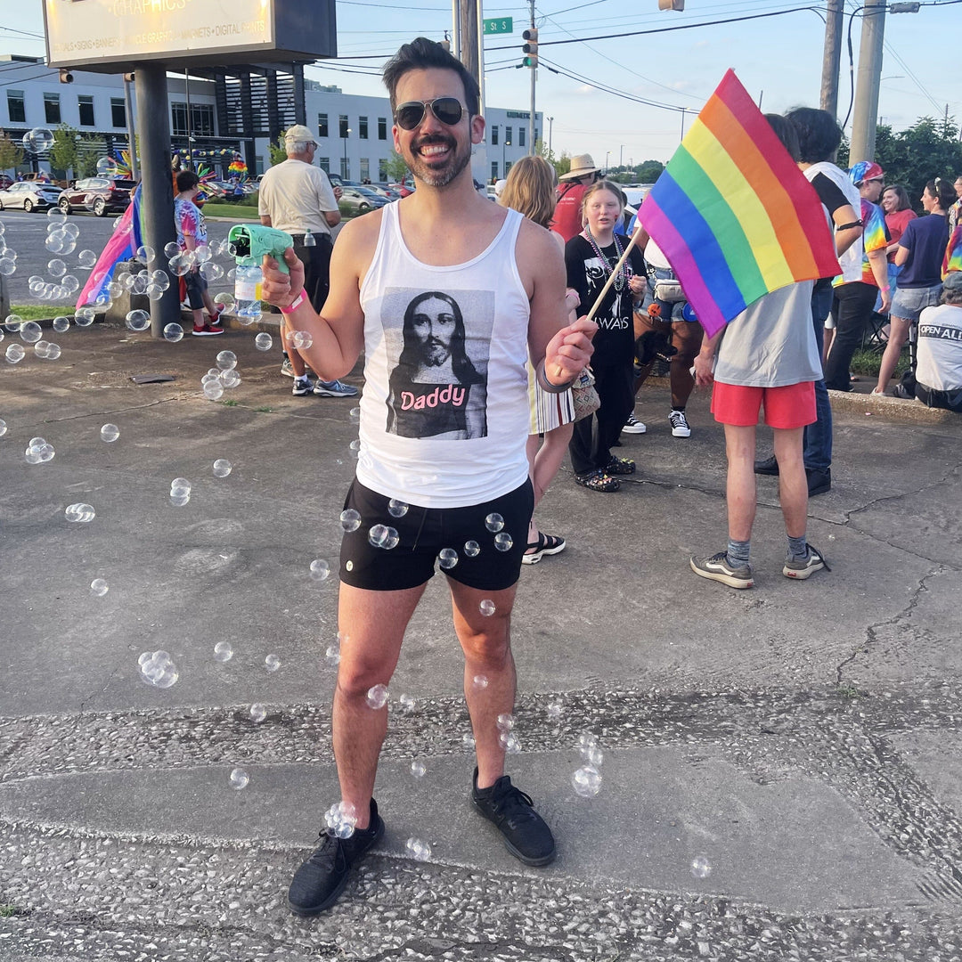 jesus daddy tank white on man w rainbow flag
