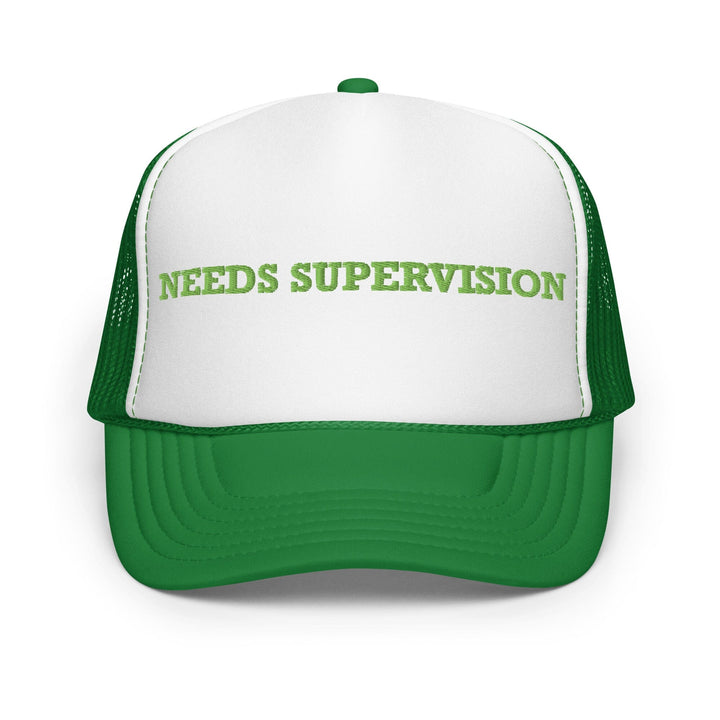 Green and white cap with golf design and coordinates on a white background