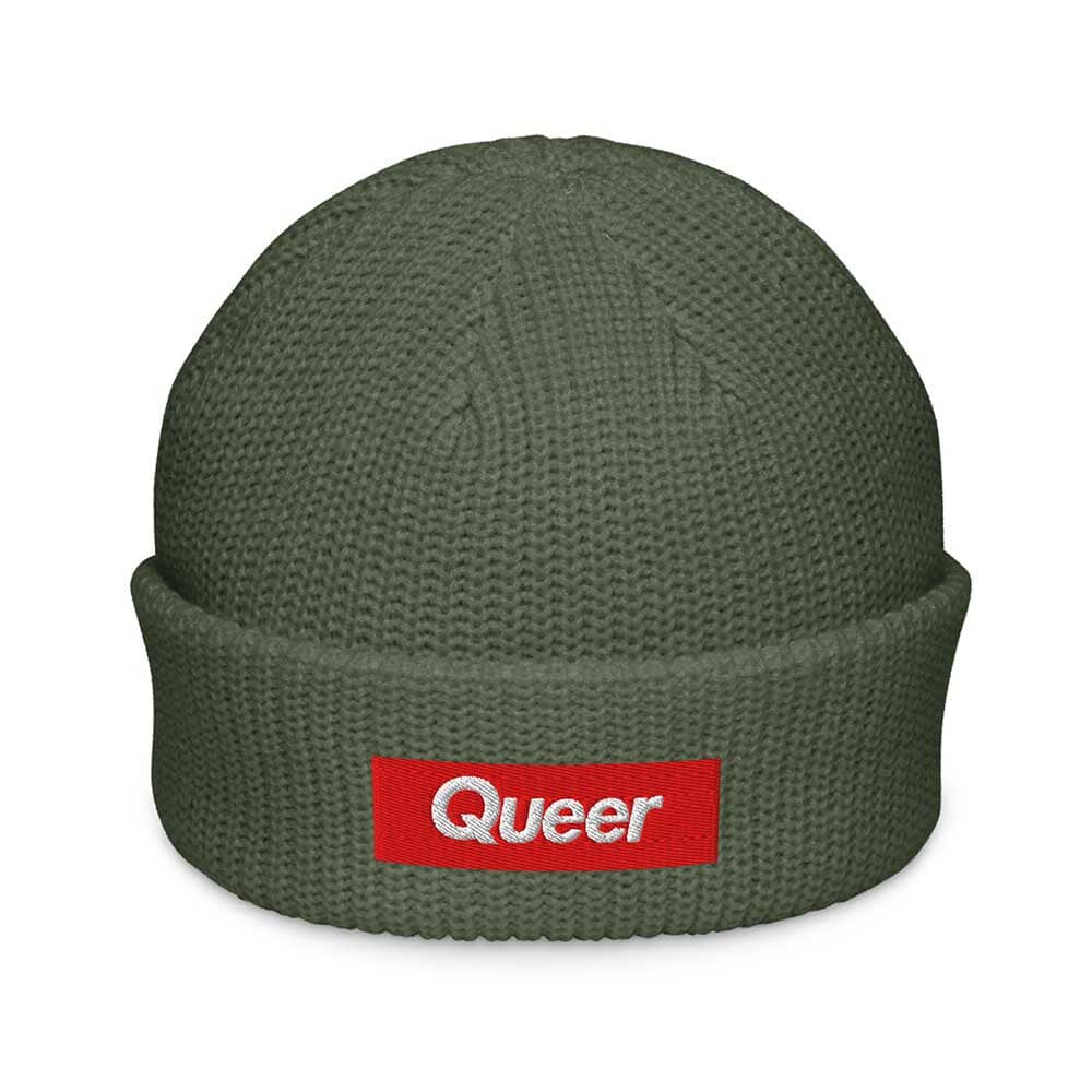 Green beanie with a red 'Queer' logo on a white background