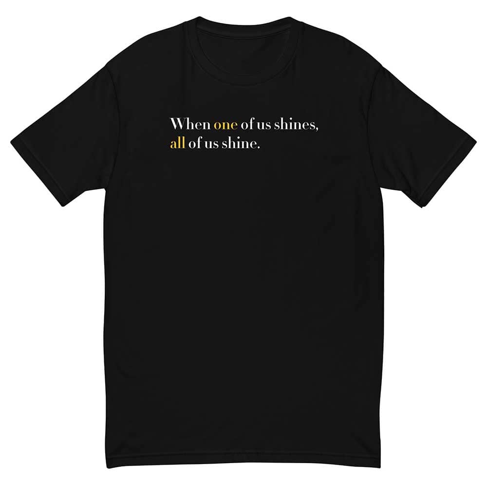 Black t-shirt with motivational quote on a white background