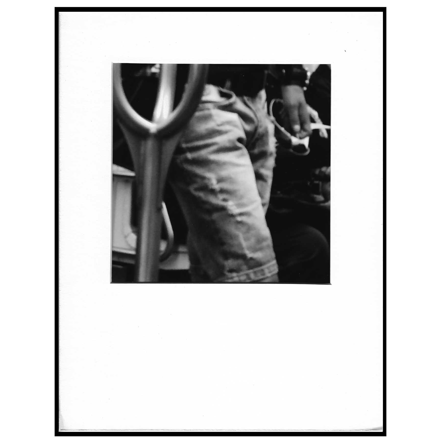 black and white photograph denim shorts on metro