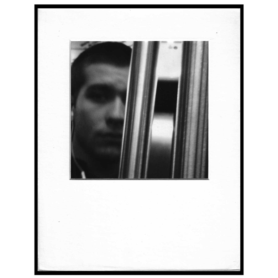 Untitled (pole obscuring face) by Vincent Gagliostro